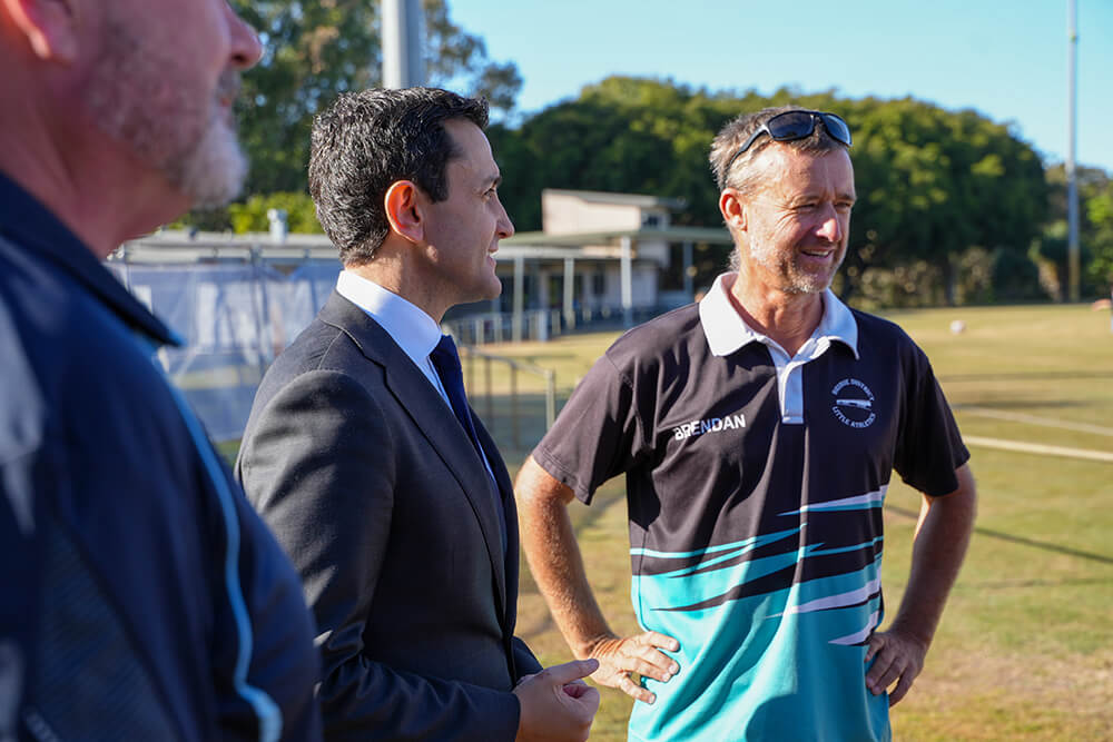 Premier with local sports club discussing Games On! upgrades to fields and facilities.
