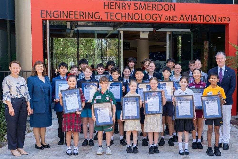 Minister Langbroek with winners of the 2025 Premier’s Coding Challenge.
